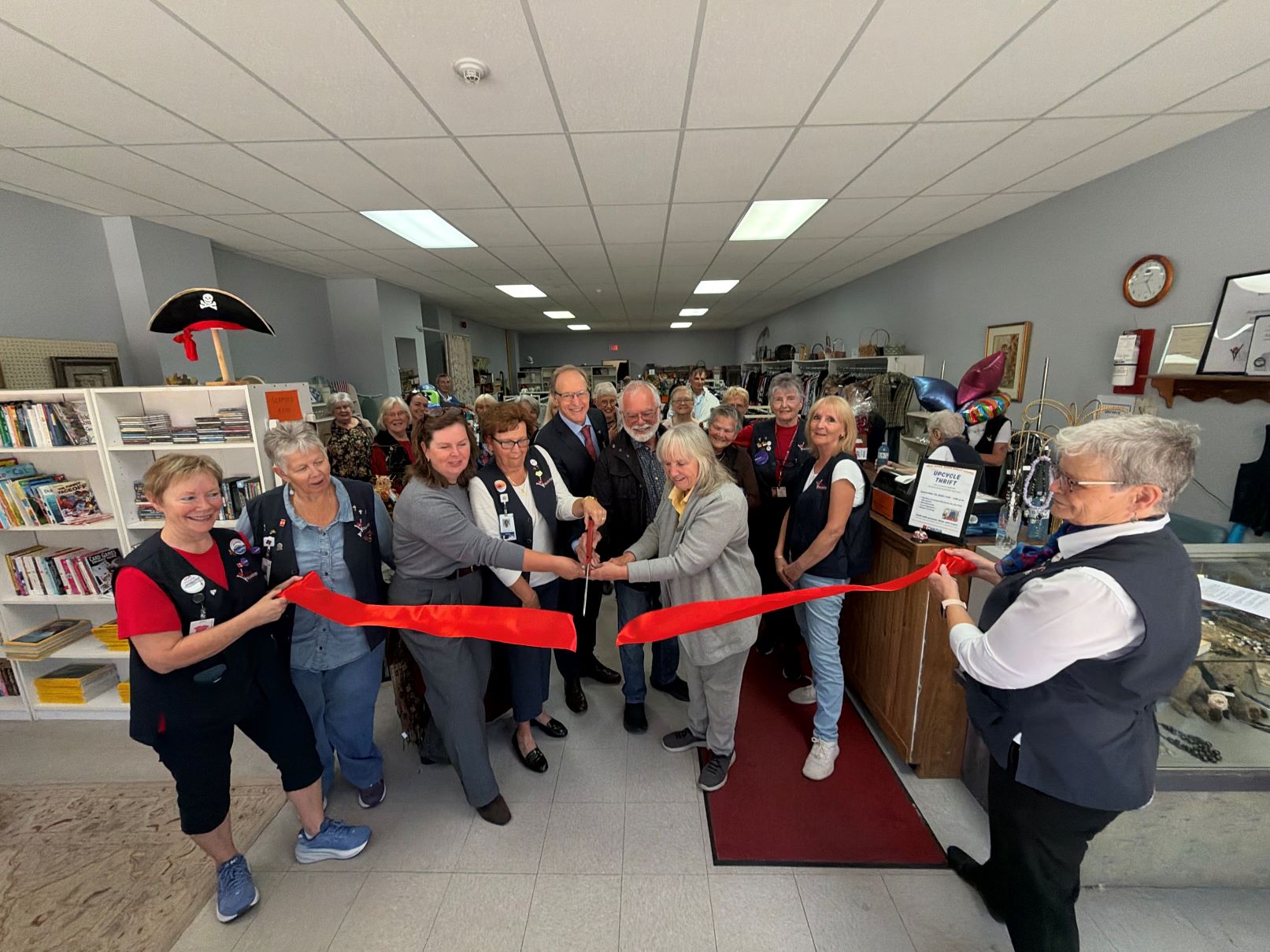 volunteers, cmh and cmhf leaders and community gather to cut the ribbon for the rebranded Upcycle Thrift