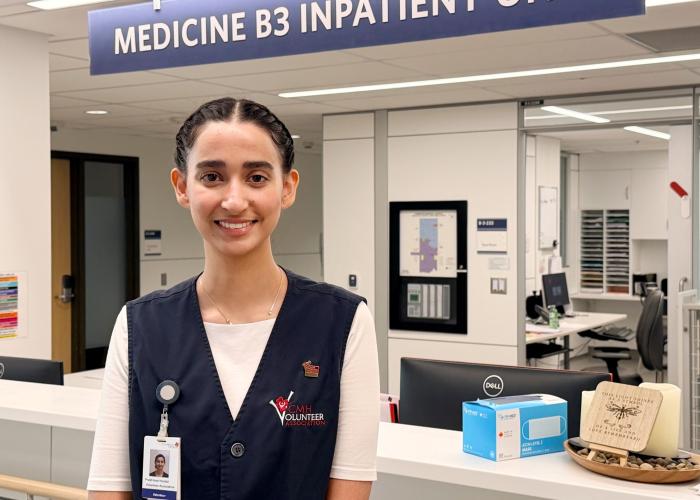Prabhleen stands in from of the unit she works in