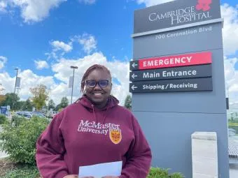 Image of a woman outside the hospital
